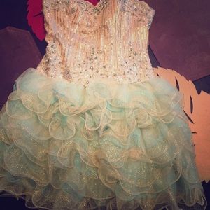 A Gorgeous Gold & Teal Color Dress With Crystals