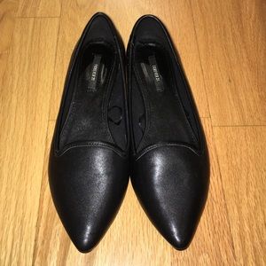 Black pointed toe flats