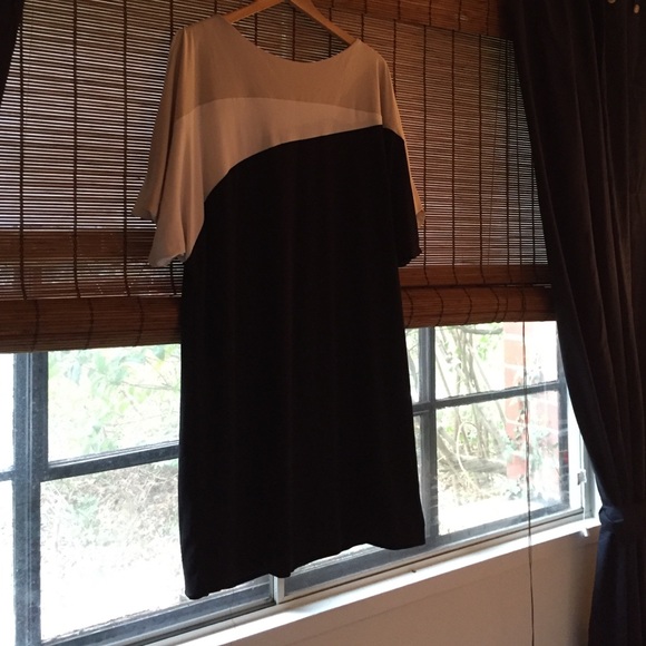 Black, cream, and white lined sheath dress