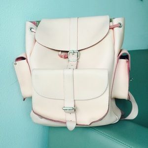 Grafea baby pink backpack. Abrasions as shown.
