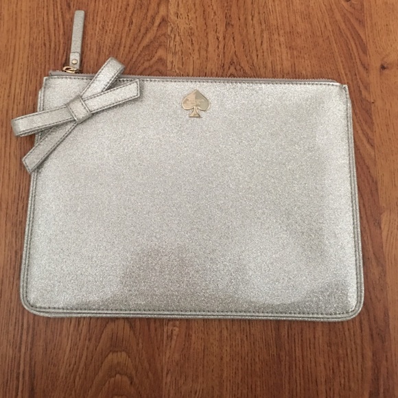 kate spade Handbags - Never worn, silver sparkle Kate Spade clutch!