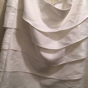 Off white beautiful suit. Worn a couple of times.