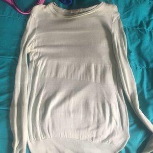 Mint green striped sweater.