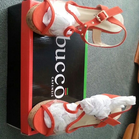 Orange wedge sandals