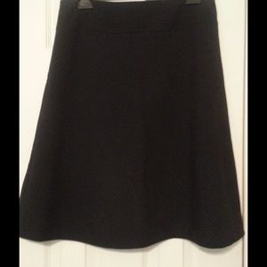 Black a-line skirt with diagonal line detail