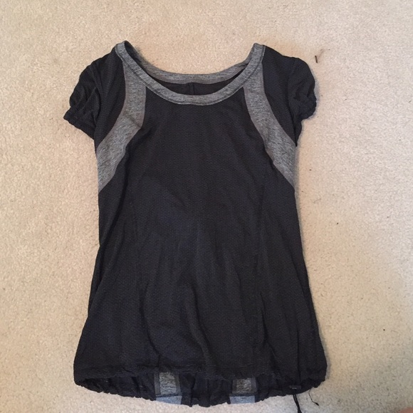 Lululemon athletic top. Black and gray with stripe