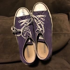 Purple beat up converse