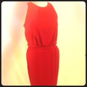 Be the Woman in red with this sleeveless dress.