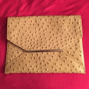 Envelope ostrich clutch.