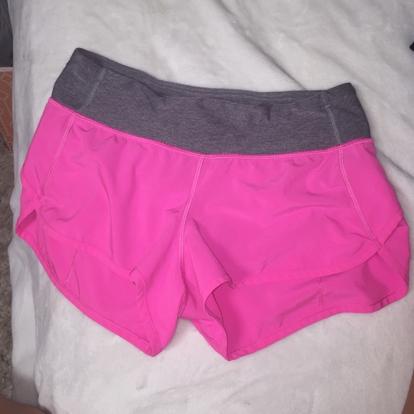size four lulu lemon shorts. bright pink