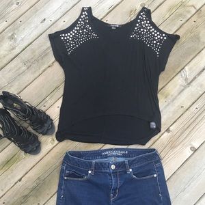 Black open-shoulder top with stud detailing