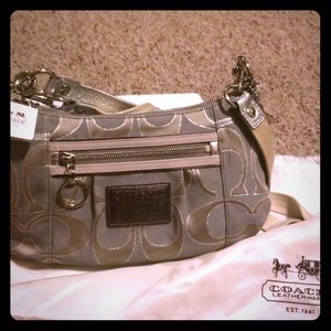 Silver coach purse with shoulder strap