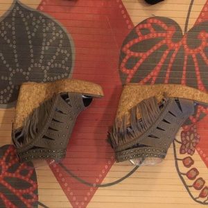 Frolic in fringe wedges. Taupe