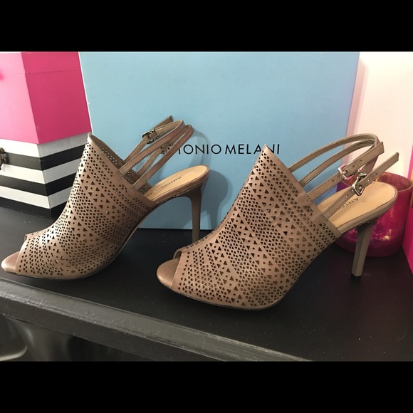 *SOLD* Brand new. The perfect tan peep toe heels. - Picture 4 of 4