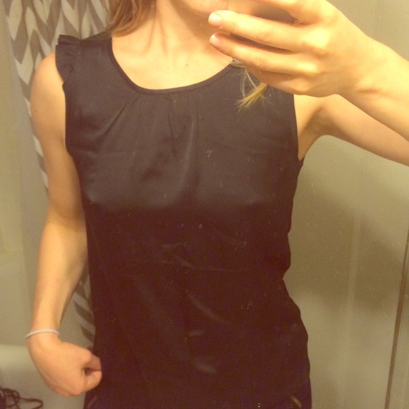 Silky black ruffle sleeveless top