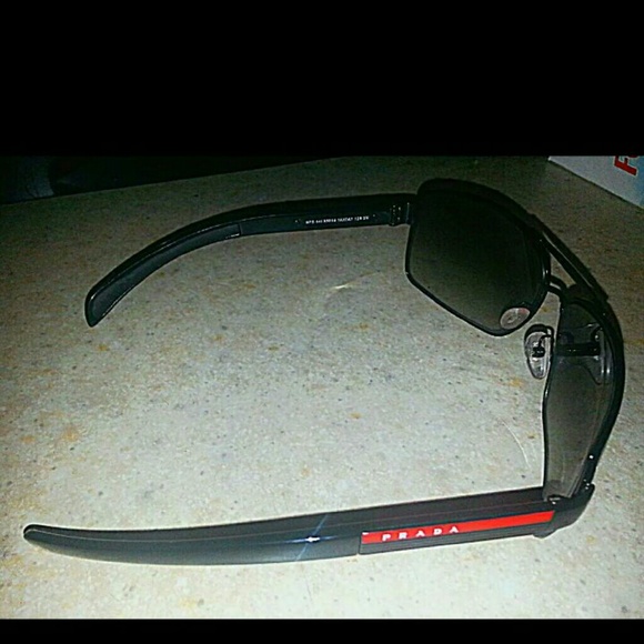 100% authenthic Prada sunglasess  unisex