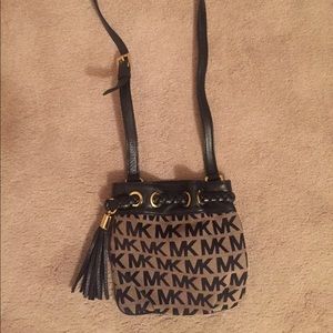 Michael Kors brown satchel with MK pattern