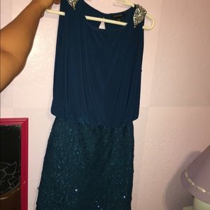 A fancy bluish green dress!