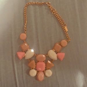 Neckless with gold and coral colors