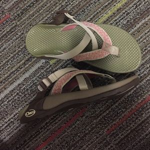 Pink and tan Chacos