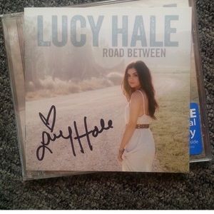 Authentic Lucy Hale autographs cd cover