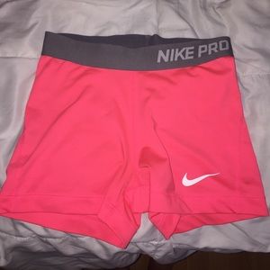 Hot pink nike pro