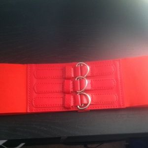 Bold red belt