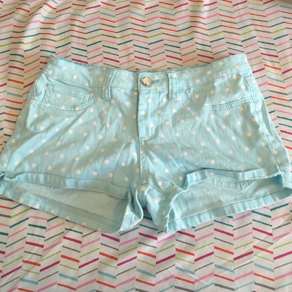 Light blue shorts with white polka dots