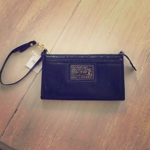 Black leather Coach Wristlet