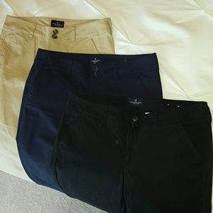 Three American Eagle stretch artist pants