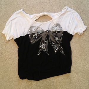 White and black shirt with sparkly bow on front