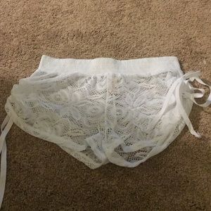 Sweet white and lacy beach bottom cover up! Size S