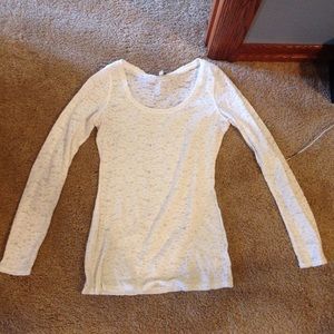 A white lacey long sleeve shirt from Express.