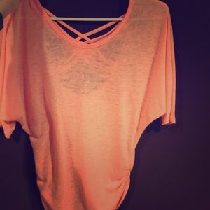 Salmon colored top with cute back