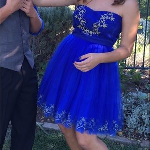 Purple fit and flare homecoming dress