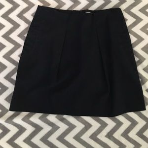 Navy pleated skirt