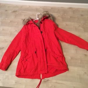 Orange jacket with fur hood