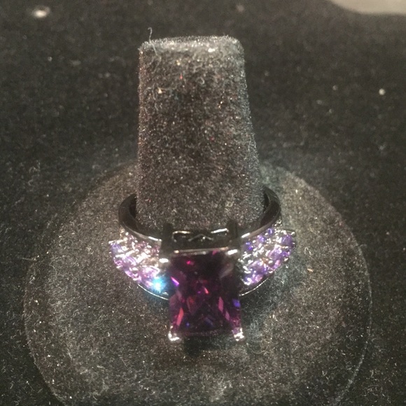 Black ring with purple stones