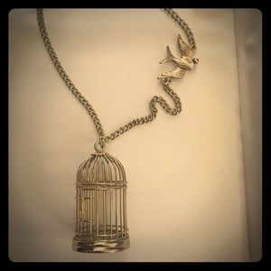 Bird and cage long statement necklace