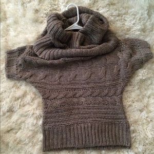 Turtle neck sweater.