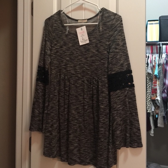 Gray and black flowing top