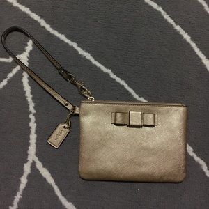 Coach gold wristlet