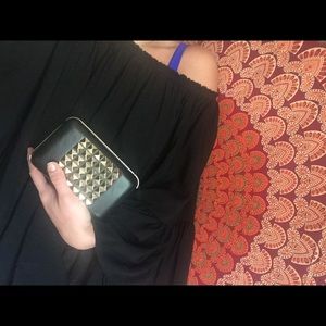 Gold studded clutch