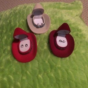 Cowboy themed earrings in cowboy hat cases