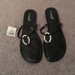 ECSA black flat sandals