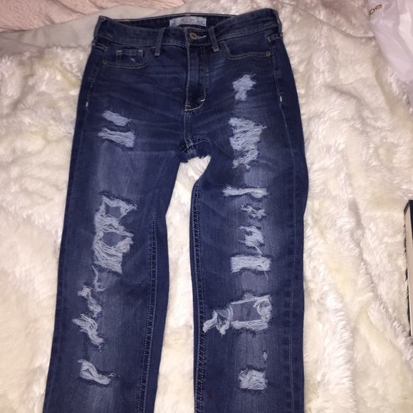 Mid/high rise skinny destroyed jeans