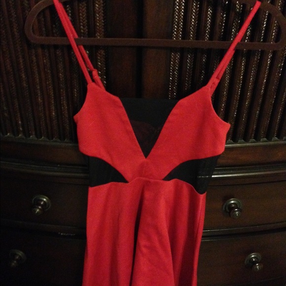 Red skater dress with black mesh cutouts