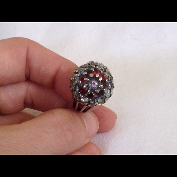 Silver ring with multi-colored gemstones
