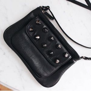 Cross body bag with studs