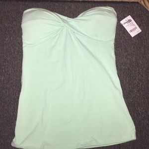 NEVER BEEN WORN strapless top.
